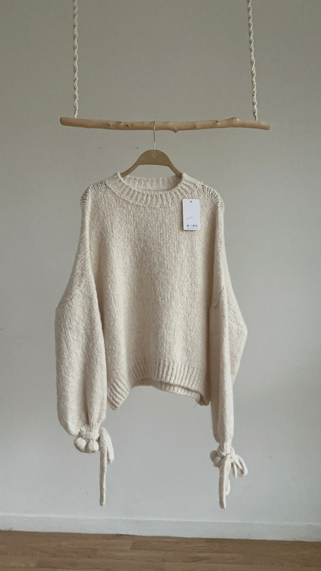 PULL à manches nouées