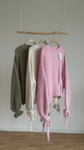 PULL à manches nouées