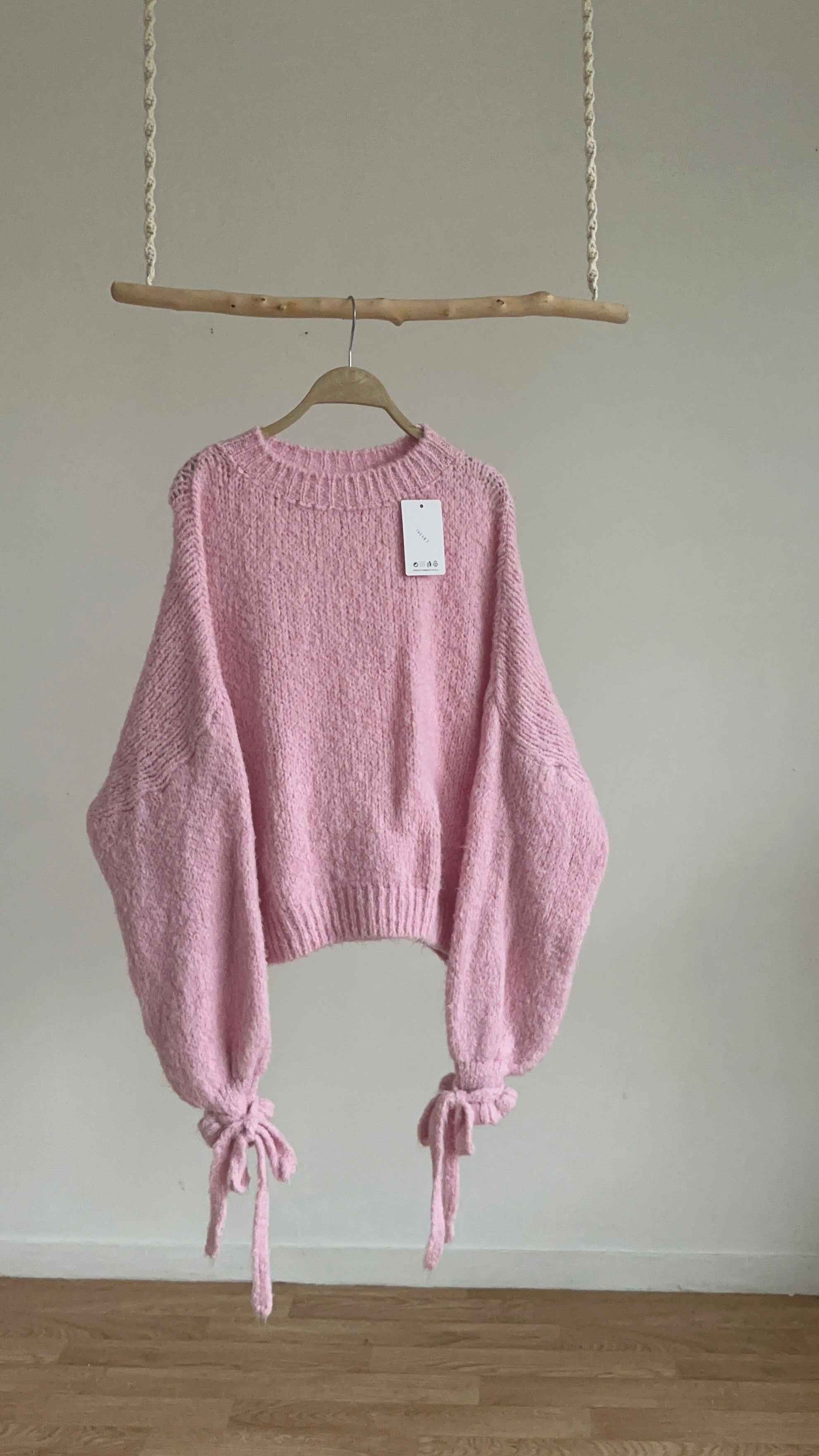 PULL à manches nouées